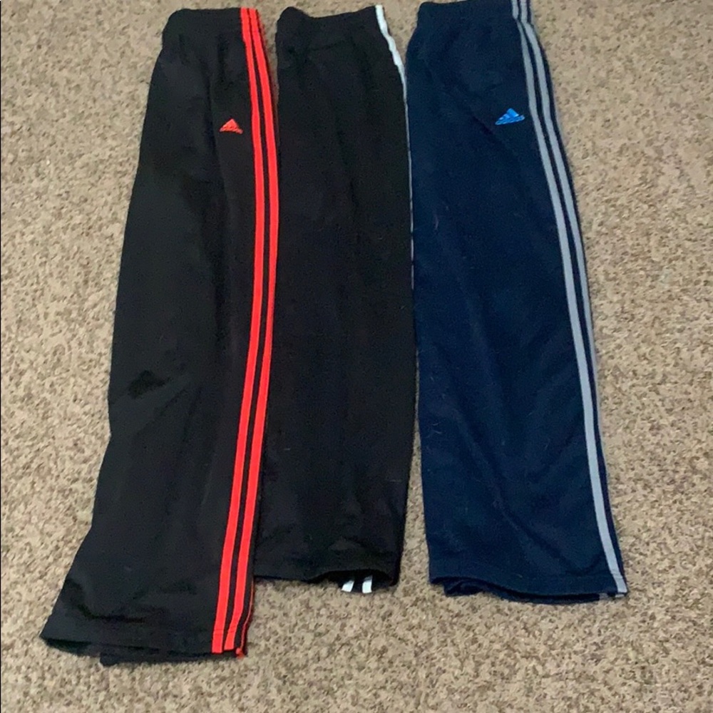 A big bundle of 2 adidas joggers and one champions